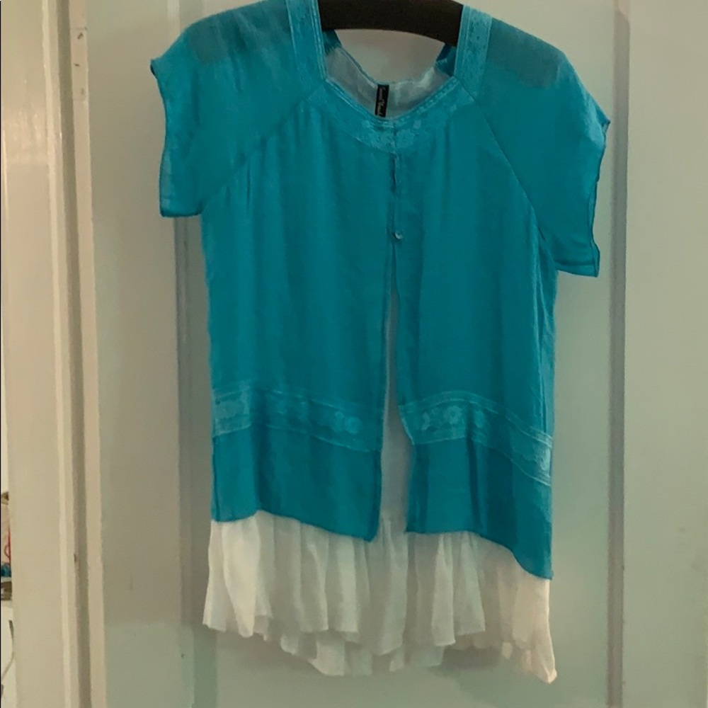 Sacred Threads top M